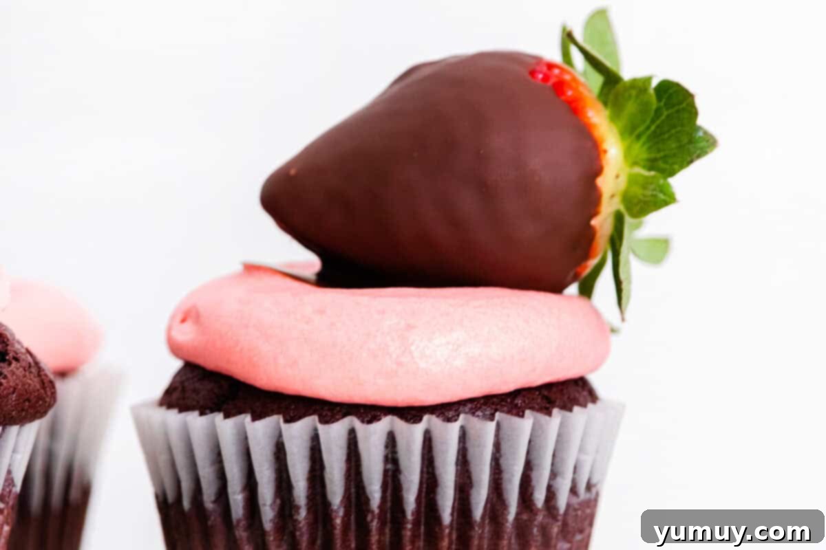 chocolate covered strawberry cupcakes on cake stand