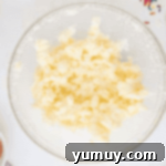 creamed butter in a glass bowl.