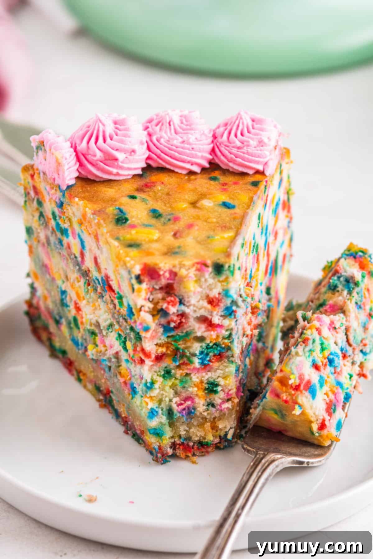 up close funfetti cheesecake with bite out