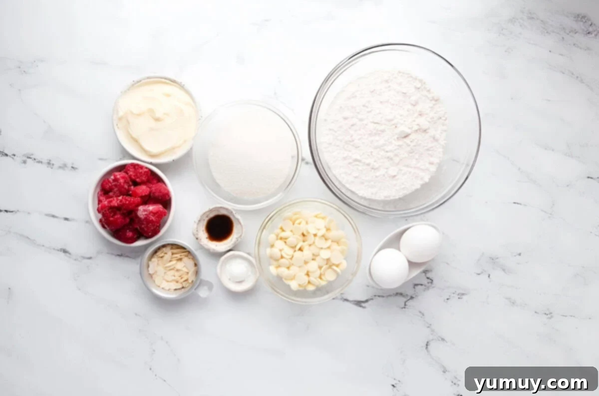 Raspberry Bliss Blondies 5 Portioned ingredients for raspberry blondies in individual containers, ready to be combined.