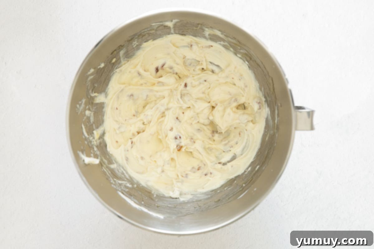 Flavored Cream Cheese: Triple the Deliciousness 11 Honey pecan cream cheese in the bowl of a stand mixer.