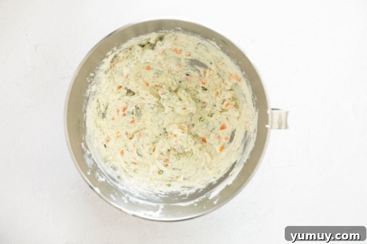 Flavored Cream Cheese: Triple the Deliciousness 12 Veggie cream cheese in the bowl of a stand mixer.