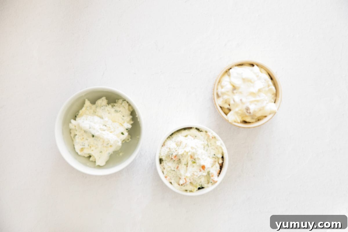 Flavored Cream Cheese: Triple the Deliciousness 13 Homemade flavored cream cheese spreads in small dishes.