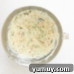 Flavored Cream Cheese: Triple the Deliciousness 6 flavored cream cheese in a stainless mixing bowl.